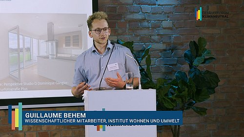 Grafik, Screenshot aus dem Video "Jahrestagung des Gebäudeforums klimaneutral | Impuls von Guillaume Behem" als Vorschau.